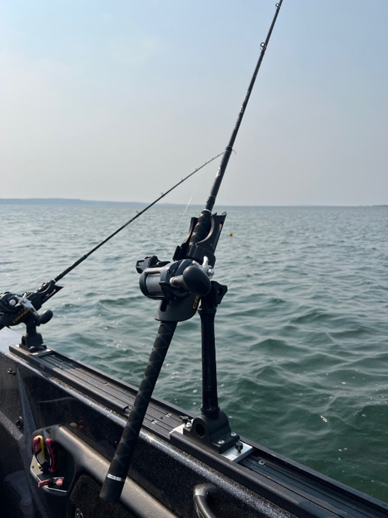 best fishing pole rod to use trolling a pro troll Okuma X-Troll Salmon Rods 992XH 9'9" ton moderate tapered carbon rod blanks provide excellent strength and durability Trolling Rod and Reel Buyer's